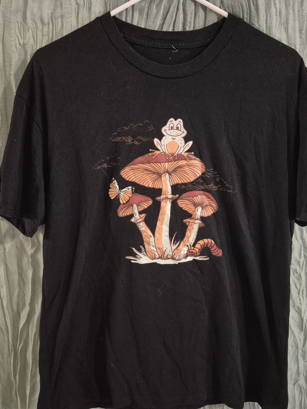 Black Graphic Tee with Orange Mushroom & Frog Design